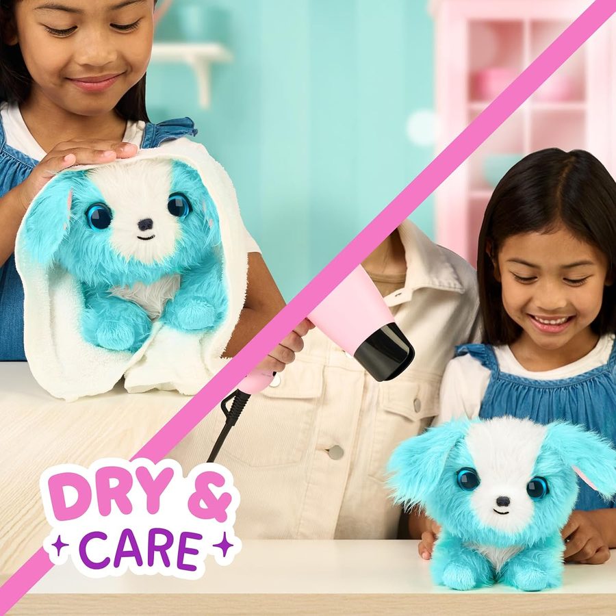 A girl drying a ScruffaLuvs pet with a towel and a hair dryer